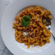 Casarecce with Lamb Shoulder & Red Wine Ragù and Parmigiano Reggiano (gf.)